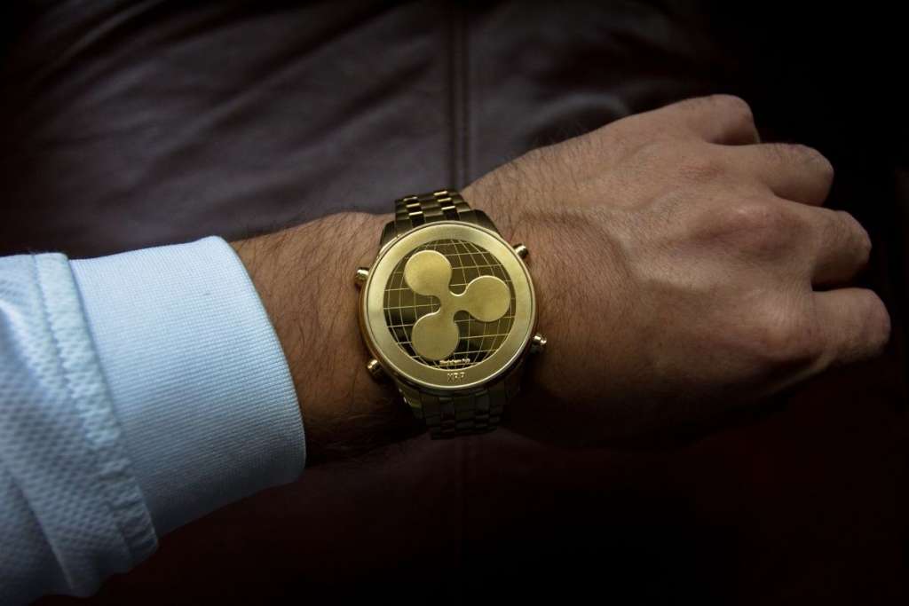 man wearing a gold watch to show why is it haram to wear gold